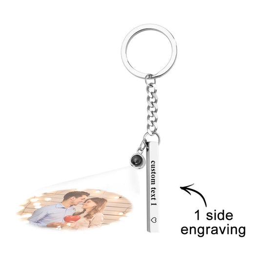 Personalised Photo Projection Keyring – polished steel engraved vertical cube pendant on a keyring, close-up showing personalised engraving and polished finish, ideal personalised keychain gift