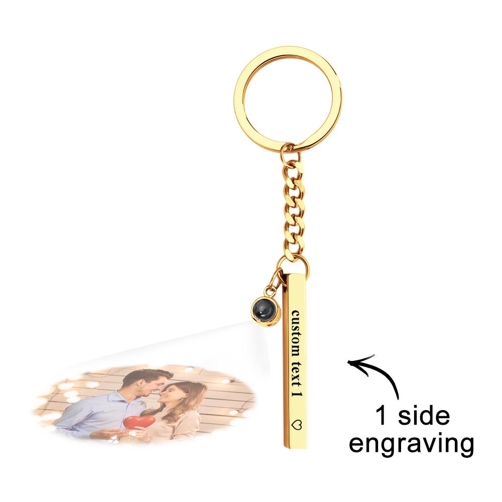 Front view of the engraved vertical cube pendant on a sturdy keyring – personalised keychain made from steel, suitable for everyday use