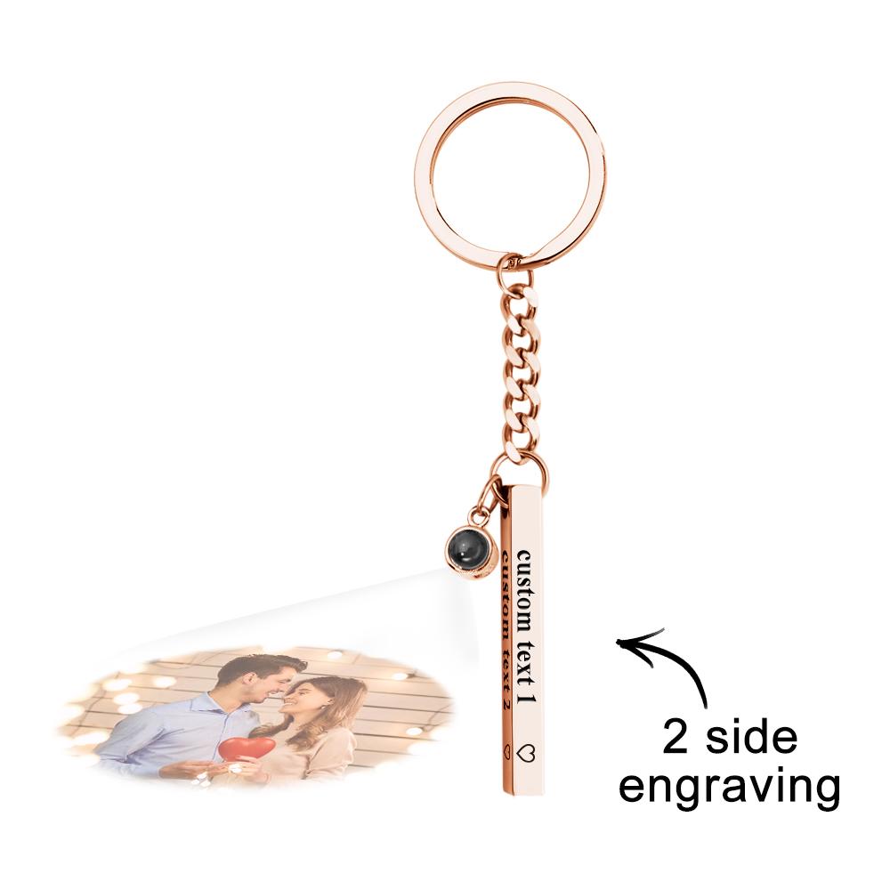 Stylish product shot of the personalised engraved cube pendant with a soft shadow, highlighting the micro-photo projection feature and polished finish