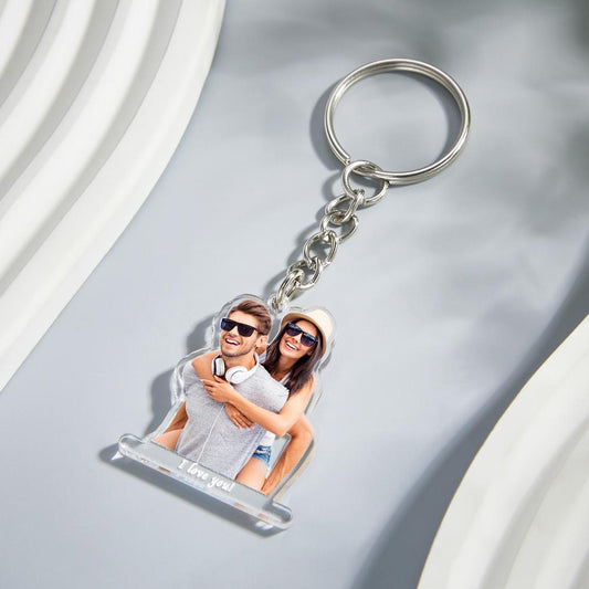 Acrylic photo keychain displayed on a neutral background with personalised name and date engraving — thoughtful personalised gift for partner or friend