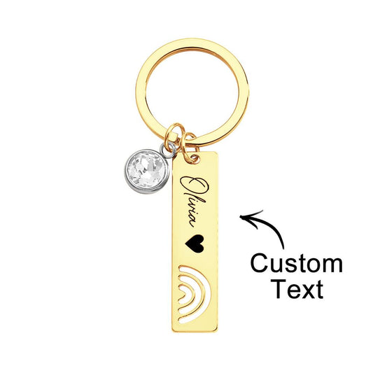 Handheld personalised engraved rainbow keyring attached to keys, showcasing the colourful design and custom text — perfect custom gift for birthdays, anniversaries or friends