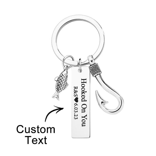 Personalised fish hook keyring attached to a set of keys highlighting the hooked design and sturdy clasp — durable customised fishing keepsake for birthdays, anniversaries and Father’s Day