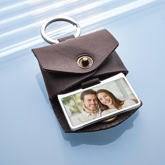 Lifestyle view of personalised leather keyring attached to keys and tucked into a pocket, compact carry-everywhere photo keepsake for couples or Valentine’s Day