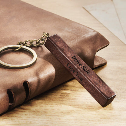 Personalised wood bar keyring variant C – light wood finish with four-sided engraving, customisable with text or uploaded image