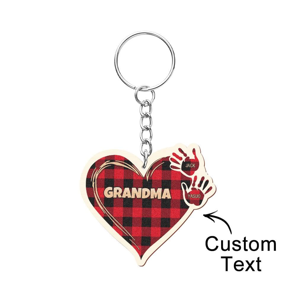 Personalised kids name keyring — hand-shaped wooden charm engraved with child's name on a durable metal split ring