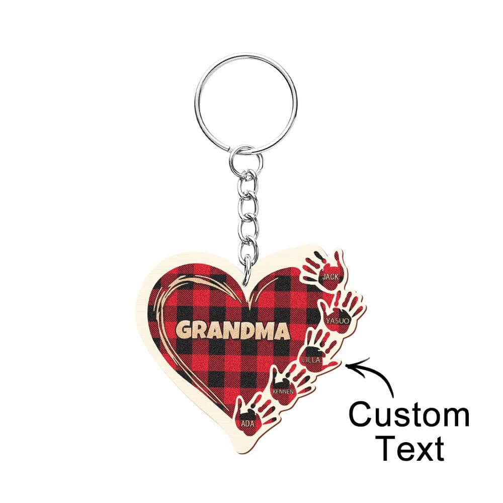 Personalised wooden hands keychain attached to keys to show scale — compact, everyday keepsake perfect for birthdays