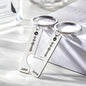 Drive Safe personalised music scan code keyring montage showing stainless steel 3D‑engraved custom name keychains