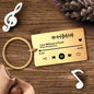 Personalised engraved music code keyring — black-trim clear acrylic plaque with scannable music code and stainless steel ring, custom song gift