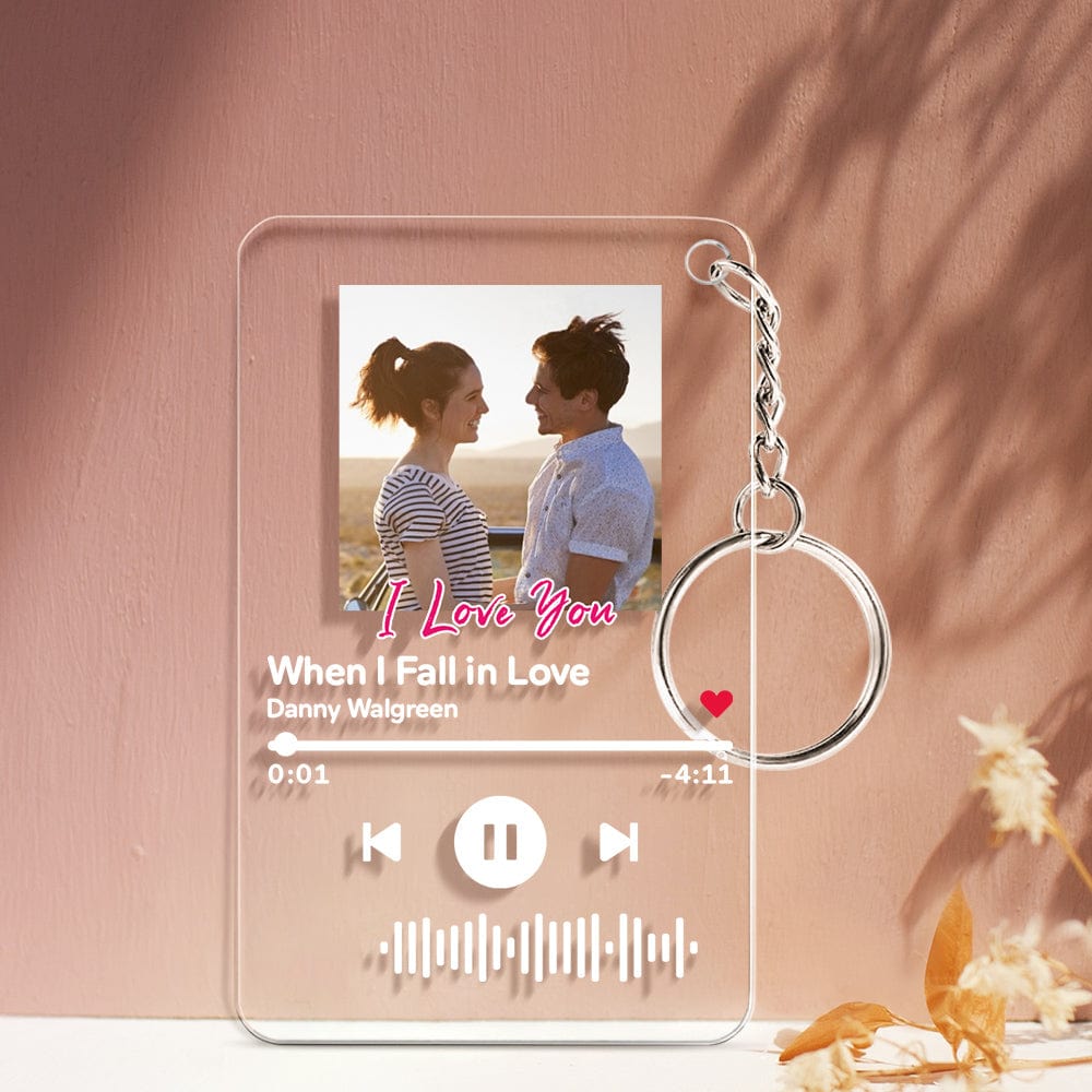 Black acrylic personalised keychain engraved with scannable music code and custom song title