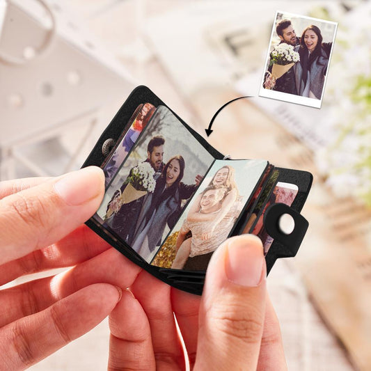 Fanned photographic prints removed from personalised leather photo keychain — high-quality photographic paper arranged as a charming surprise reveal