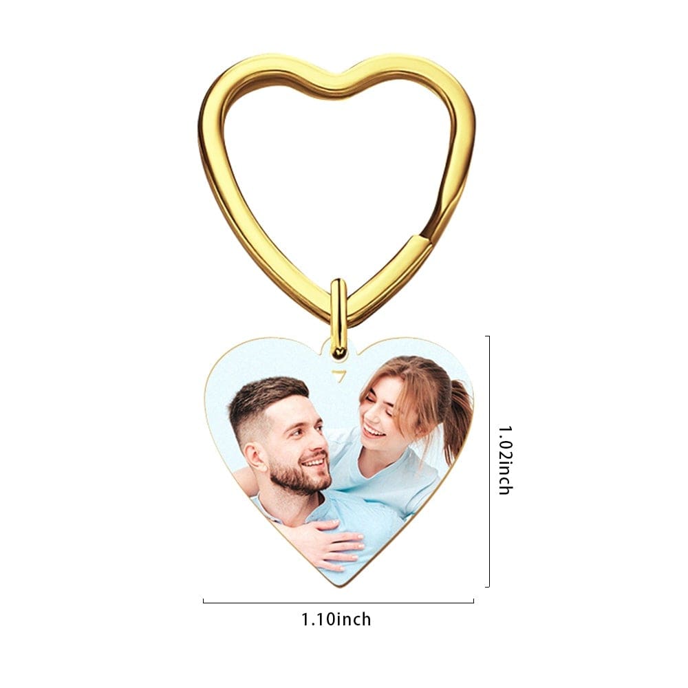 Gold heart photo keychain showing a highlighted calendar date and personalised engraving – stainless steel keepsake in gold finish