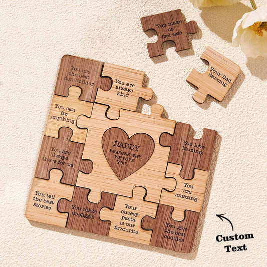 Engraved interlocking puzzle ornament hanging with ribbon on a Christmas tree, personalised timber gift for Dad or family keepsake