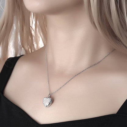 Embossed Heart Photo Locket Necklace, platinum-plated copper with engraved heart detail — personalised gift