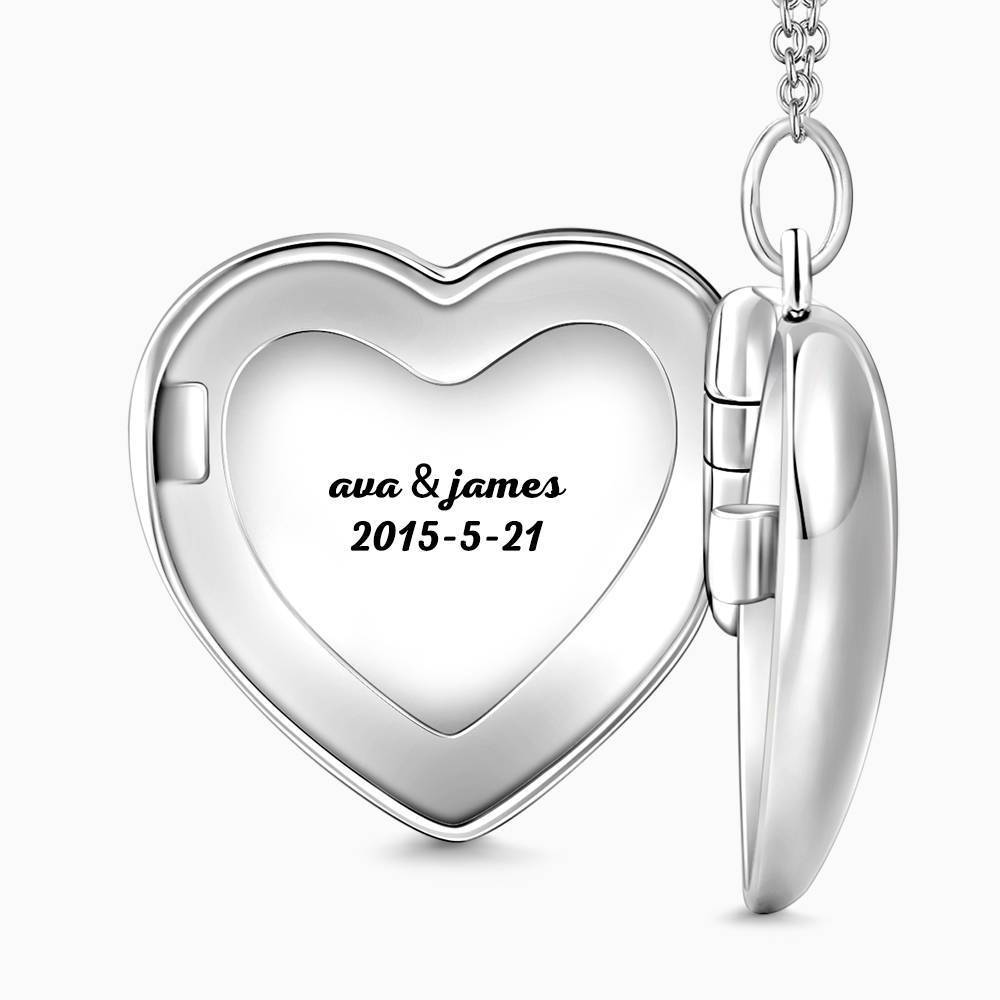Open embossed heart photo locket showing a personalised photograph inside — engraved, platinum-plated photo locket