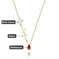 Side view of personalised name and birth flower pendant on 22 inch copper chain highlighting fine engraving and finish
