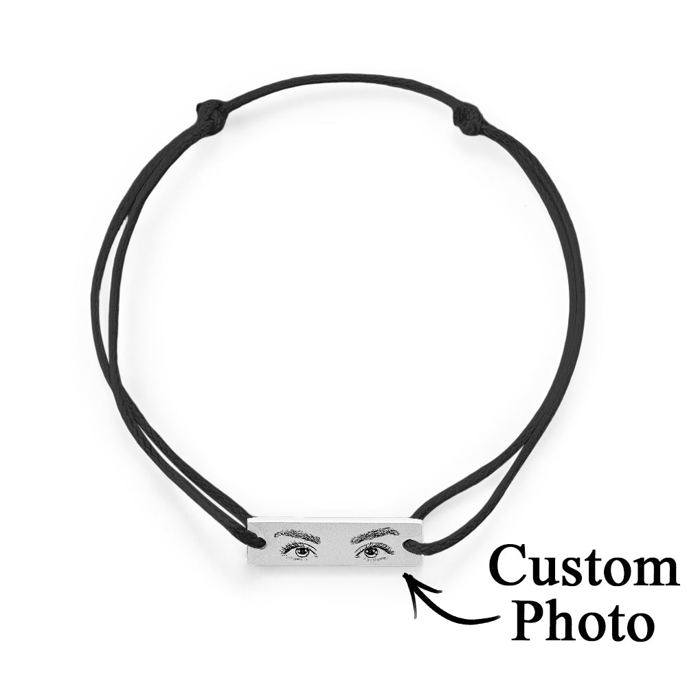 Personalised Eyes Photo Bracelet displayed on white background highlighting oval 2.2 x 0.6 cm engraved charm