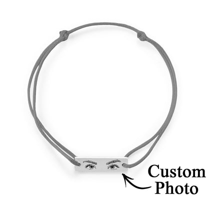Craftsmanship close-up showing precision micro-engraving process used for the personalised eyes photo bracelet