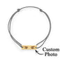 Detailed shot of hypoallergenic surgical-grade stainless steel charm on personalised eyes photo bracelet — tarnish resistant