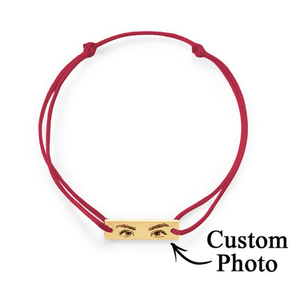 Multiple bracelet options laid out to suggest gifting ideas — personalised engraved eyes for parents, partners or memorials
