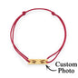 Multiple bracelet options laid out to suggest gifting ideas — personalised engraved eyes for parents, partners or memorials