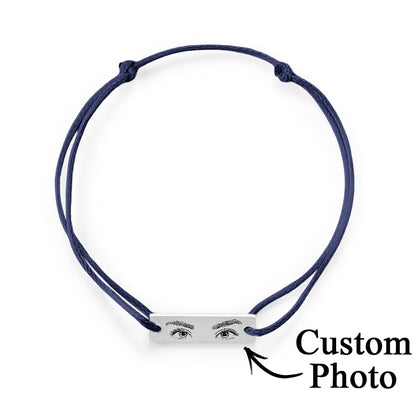 Close-up of custom engraving quality compared with standard etching — superior detail on personalised eyes photo bracelet