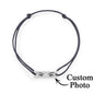 Detail image of the bracelet's hypoallergenic steel finish and the crisp engraving on the personalised eyes charm