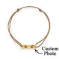 Final product shot showing the personalised eyes photo bracelet in full — adjustable, custom engraved and ready to gift