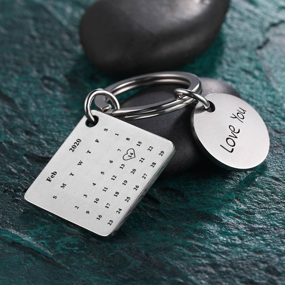 Square and circular personalised photo keyrings displayed together — customised engraved calendar keychain ideal for wedding favours