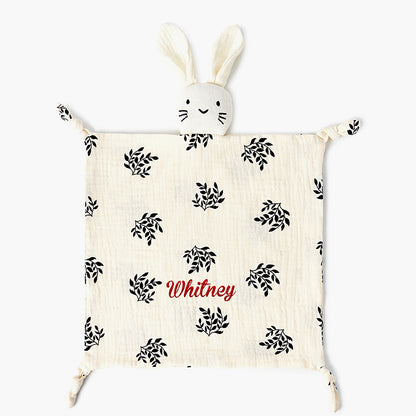 Close-up of embroidered name on personalised baby comforter