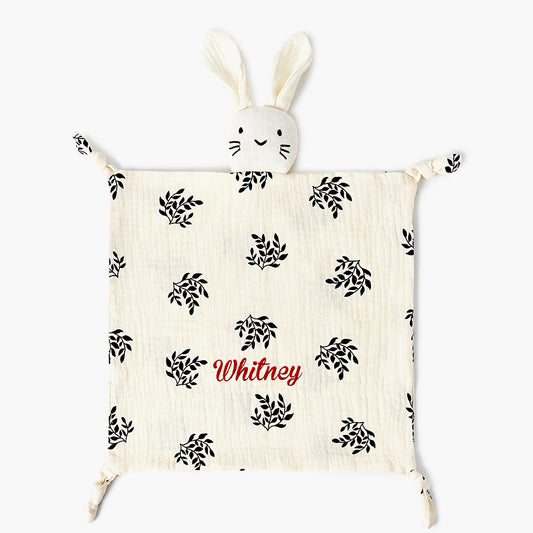 Close-up of embroidered name on personalised baby comforter