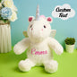 Personalised unicorn plush held in hand to show size (approx. 28.5×40 cm), perfect custom baby name soft toy for newborns