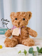 Detail shot of embroidered paw and name on personalised birth announcement bear, premium plush quality