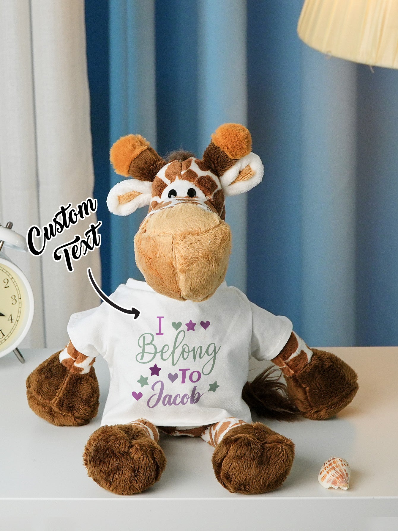 Personalised plush photographed in nursery setting to show decorative use as a birth announcement keepsake