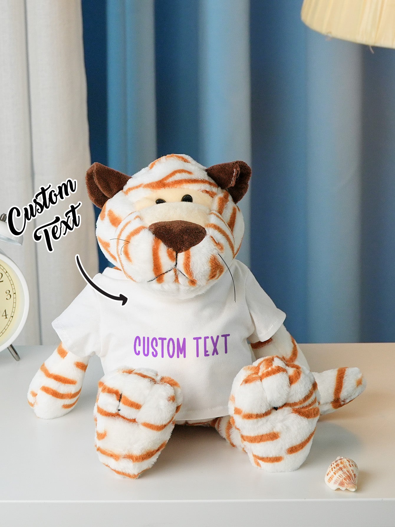 Personalised plush sitting upright on nursery shelf to illustrate styling and space-saving size — ideal baby gift