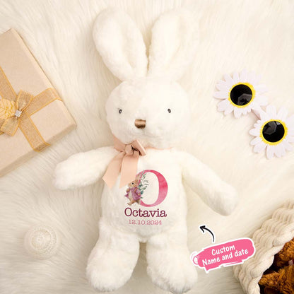 Personalised bunny plush toy in pastel outfit with custom name, charming nursery decor and keepsake for infants