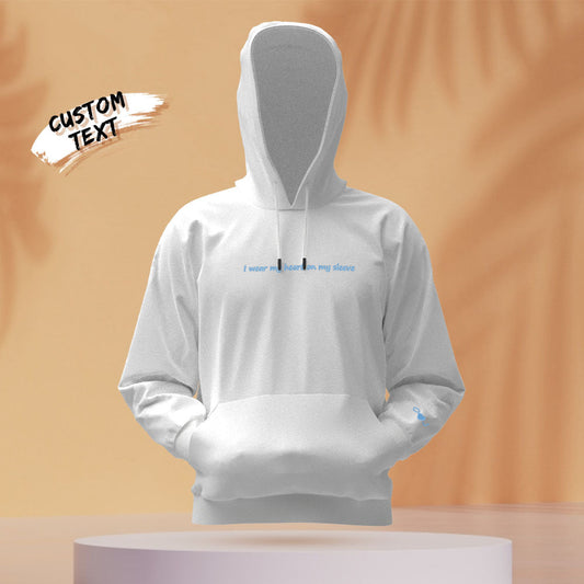 Personalised embroidered 'Heart On My Sleeve' unisex hoodie front view showing embroidered heart on sleeve and custom text — matching couple gift