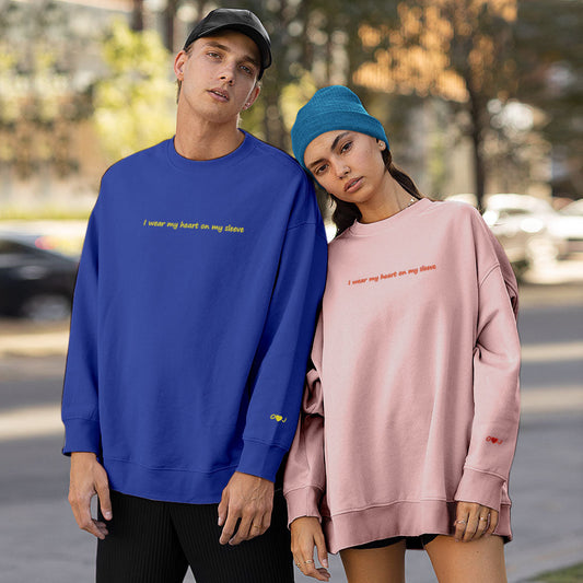 Front view of round-neck personalised hoodie with 'Heart On My Sleeve' embroidered design – personalised engraved gift for her