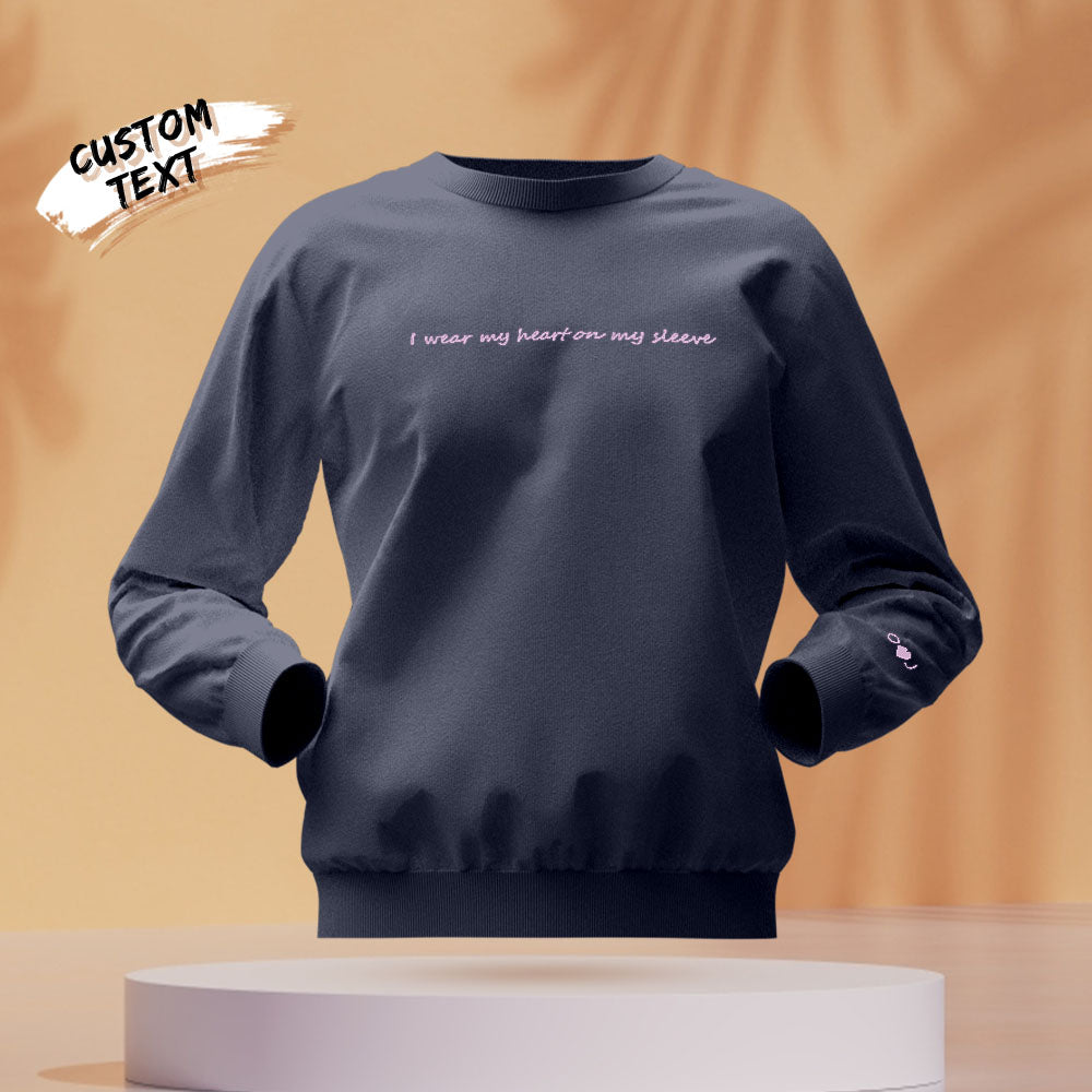 Hoodie on display with clear 'Heart On My Sleeve' embroidered design – available in 10 colours, perfect gifts for her