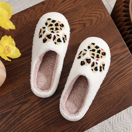 Festive styling of cosy Christmas slippers paired with pyjamas — ideal gift for women, mum, wife or friends