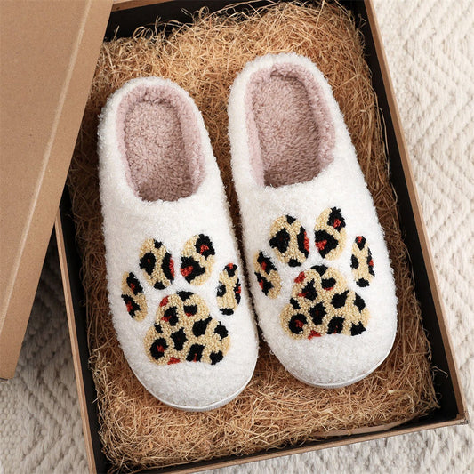 Festive styling of cosy Christmas slippers paired with pyjamas — ideal gift for women, mum, wife or friends