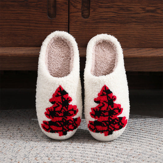 Red Christmas tree cotton slippers in plush fabric, front view of open‑mouth slip‑ons with padded interior and PVC sole for cosy indoor wear