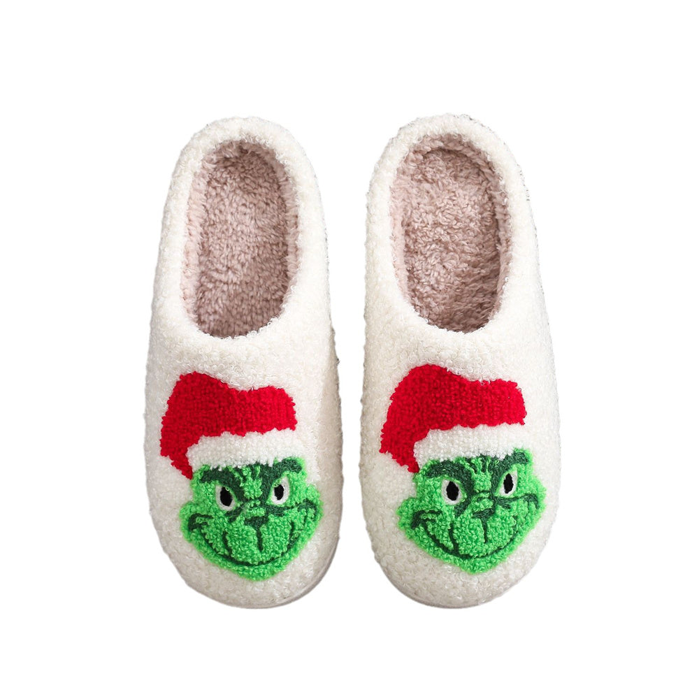 Sole detail of Christmas Grinch slippers showing durable PVC non‑slip sole for indoor wear