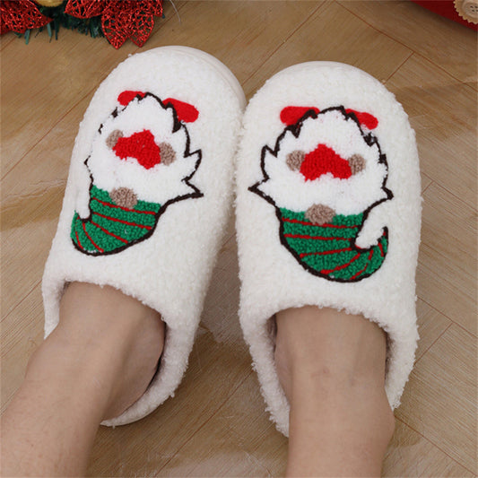 Lifestyle image of wearing faceless gnome slippers indoors, cosy festive scene – ideal Christmas gift plush home cotton slippers