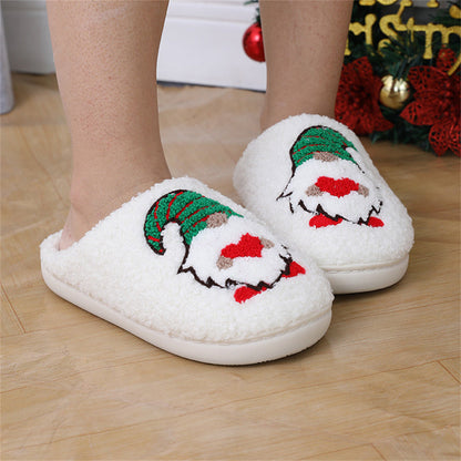 Side view of Christmas faceless gnome slipper highlighting open‑mouth slip‑on fit and durable TPR sole – cosy velvet home slippers