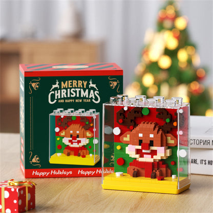 Child using Christmas building block toys — encourages hands-on learning, creativity and imaginative play