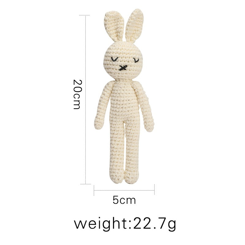 Close-up texture of crocheted cotton stitches on animal rattle – soft, breathable and baby-friendly material