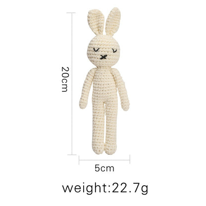 Close-up texture of crocheted cotton stitches on animal rattle – soft, breathable and baby-friendly material
