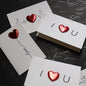 Love Greeting Cards three-dimensional heartbeat creative set of 3 displayed 10×15 cm showing heartbeat line with red heart, floating heart balloon and I♥U typography – romantic valentine's and anniversary cards