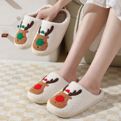 Underside view showing TPV durable non‑slip sole and cushioned padding of Christmas Reindeer Plush Slippers for secure indoor grip