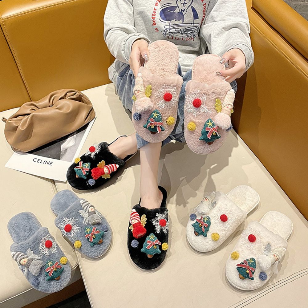 Underside view showing durable rubber sole of Christmas plush slippers - non-slip grip and supportive padding for indoor wear and Christmas parties